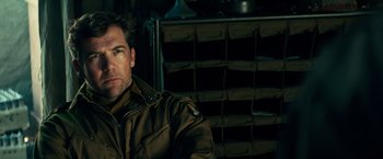 Movie still from “Overlord” (2018), directed by Julius Avery – A person wearing a jacket; Close Up shot, Over the shoulder angle