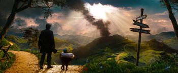 Movie still from “Oz the Great and Powerful” (2013), directed by Sam Raimi – A person standing on top of a wooden platform; Extreme Wide shot, High angle