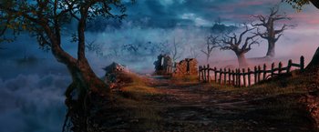 Movie still from “Oz the Great and Powerful” (2013), directed by Sam Raimi – An image of an old house in the middle of the night; Extreme Wide shot, High angle