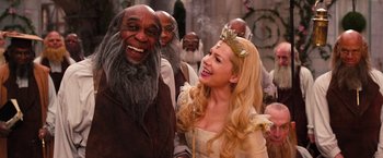 Movie still from “Oz the Great and Powerful” (2013), directed by Sam Raimi – A man and a woman dressed in costumes; Medium shot, Over the shoulder angle