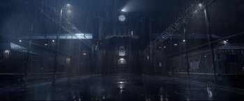 Movie still from “Paddington 2” (2017), directed by Paul King – A large building with a clock on the front of it; Extreme Wide shot, High angle