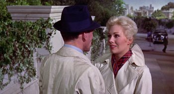 Movie still from “Pal Joey” (1957), directed by George Sidney – A man and a woman talking to each other; Medium shot, Over the shoulder angle