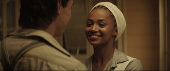 Movie still from “Palm Trees in the Snow” (2015), directed by Fernando González Molina – A man and a woman smiling at each other; Close Up shot, Over the shoulder angle