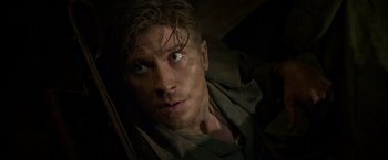 Movie still from “Pan” (2015), directed by Joe Wright – A person looking at the camera; Close Up shot, High angle