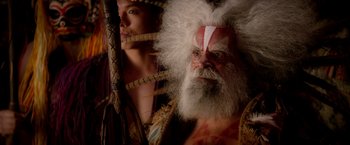 Movie still from “Pan” (2015), directed by Joe Wright – A man with a white beard and a man with a red and white beard; Close Up shot, Over the shoulder angle