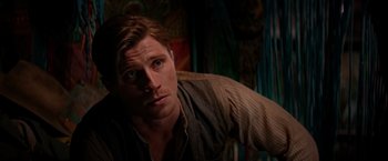 Movie still from “Pan” (2015), directed by Joe Wright – A person wearing a brown shirt; Close Up shot, Over the shoulder angle