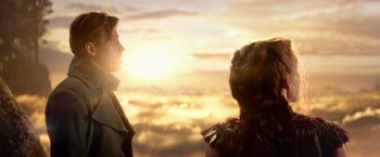 Movie still from “Pan” (2015), directed by Joe Wright – Two people standing in front of the setting sun; Close Up shot, Over the shoulder angle