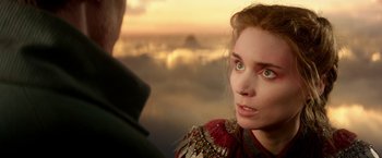 Movie still from “Pan” (2015), directed by Joe Wright – A person with a sky in the background; Close Up shot, Over the shoulder angle
