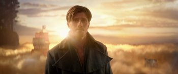 Movie still from “Pan” (2015), directed by Joe Wright – A person wearing a jacket; Close Up shot, Over the shoulder angle