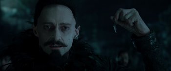 Movie still from “Pan” (2015), directed by Joe Wright – A person with a beard; Close Up shot, High angle