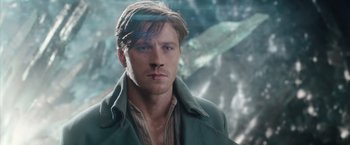 Movie still from “Pan” (2015), directed by Joe Wright – A person wearing a green jacket; Close Up shot, Low angle