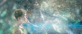 Movie still from “Pan” (2015), directed by Joe Wright – A man is looking up at the sky; Medium shot, Low angle