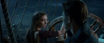 Movie still from “Pan” (2015), directed by Joe Wright – A young woman and a young man on a boat; Close Up shot, Over the shoulder angle