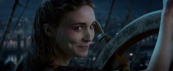 Movie still from “Pan” (2015), directed by Joe Wright – A woman's face in the dark; Close Up shot, Over the shoulder angle