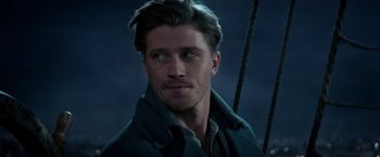 Movie still from “Pan” (2015), directed by Joe Wright – A person wearing a jacket; Close Up shot, Over the shoulder angle