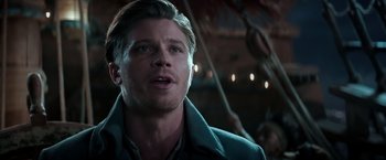 Movie still from “Pan” (2015), directed by Joe Wright – A person wearing a jacket; Close Up shot, Over the shoulder angle