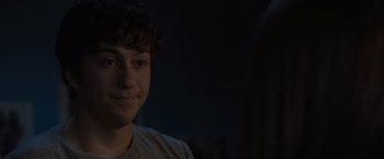 Movie still from “Paper Towns” (2015), directed by Jake Schreier – A person smiling at the camera; Close Up shot, Over the shoulder angle