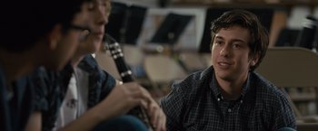 Movie still from “Paper Towns” (2015), directed by Jake Schreier – A man sitting next to another man holding a guitar; Close Up shot, Over the shoulder angle
