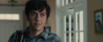 Movie still from “Paper Towns” (2015), directed by Jake Schreier – A young man is looking into the camera; Close Up shot, Over the shoulder angle