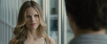 Movie still from “Paper Towns” (2015), directed by Jake Schreier – A beautiful young woman with long blonde hair; Close Up shot, Over the shoulder angle