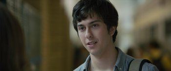Movie still from “Paper Towns” (2015), directed by Jake Schreier – A young man is looking into the camera; Close Up shot, Over the shoulder angle