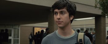 Movie still from “Paper Towns” (2015), directed by Jake Schreier – A young man is looking into the distance; Close Up shot, Over the shoulder angle
