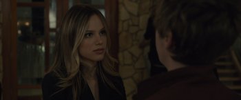 Movie still from “Paper Towns” (2015), directed by Jake Schreier – A woman in black jacket looking at a man in black jacket; Close Up shot, Over the shoulder angle