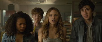 Movie still from “Paper Towns” (2015), directed by Jake Schreier – A woman is holding a toothbrush in her mouth; Close Up shot, Over the shoulder angle