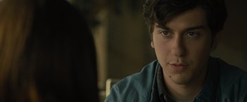Movie still from “Paper Towns” (2015), directed by Jake Schreier – A young man's face in front of a mirror; Close Up shot, Over the shoulder angle