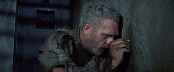 Movie still from “Papillon” (1973), directed by Franklin J. Schaffner – A person wearing a jacket; Close Up shot, Low angle