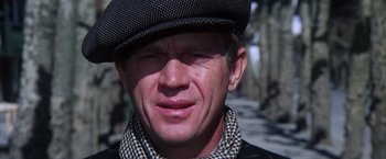 Movie still from “Papillon” (1973), directed by Franklin J. Schaffner – A person wearing a hat; Close Up shot, Low angle
