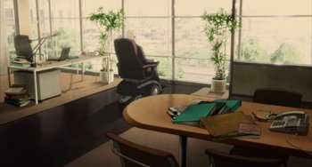 Movie still from “Paprika” (2006), directed by Satoshi Kon – An image of a room with a table and chair in it; Wide shot, High angle