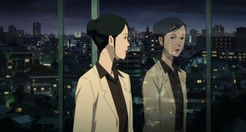 Movie still from “Paprika” (2006), directed by Satoshi Kon – Two women are standing next to each other in front of a city; Medium shot, Over the shoulder angle