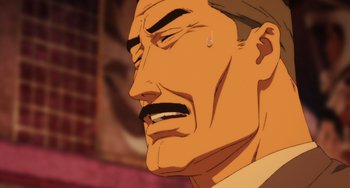 Movie still from “Paprika” (2006), directed by Satoshi Kon – An animated man with a crying expression on his face; Extreme Close Up shot, High angle