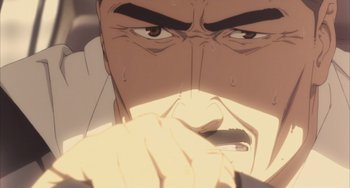 Movie still from “Paprika” (2006), directed by Satoshi Kon – An animated man with his hand over his mouth; Extreme Close Up shot, Low angle