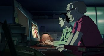 Movie still from “Paprika” (2006), directed by Satoshi Kon – A group of people sitting in front of a television; Medium shot, High angle