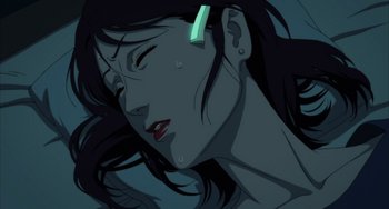 Movie still from “Paprika” (2006), directed by Satoshi Kon – A woman's face with a green light in her ear; Extreme Close Up shot, Overhead angle
