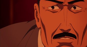 Movie still from “Paprika” (2006), directed by Satoshi Kon – An animated picture of a man's face with his eyes wide open; Extreme Close Up shot, Low angle