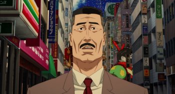 Movie still from “Paprika” (2006), directed by Satoshi Kon – An animated picture of a man in a suit; Close Up shot, Low angle