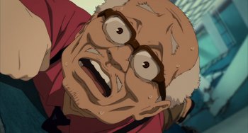 Movie still from “Paprika” (2006), directed by Satoshi Kon – An old man with glasses is looking at the camera; Close Up shot, Low angle