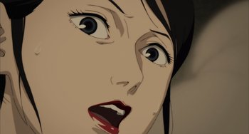 Movie still from “Paprika” (2006), directed by Satoshi Kon – A woman's face is shown in a painting style; Extreme Close Up shot, Overhead angle