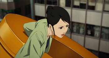 Movie still from “Paprika” (2006), directed by Satoshi Kon – An animated picture of a woman leaning on a wall; Close Up shot, High angle