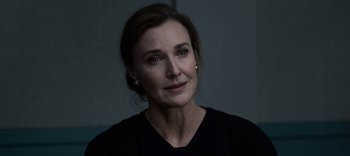 Movie still from “13 Reasons Why” (2017), created by Brian Yorkey – A person wearing a black shirt; Close Up shot, Over the shoulder angle