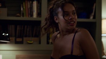 Movie still from “13 Reasons Why” (2017), created by Brian Yorkey – A young woman in a purple bra is smiling for the camera; Close Up shot, Over the shoulder angle