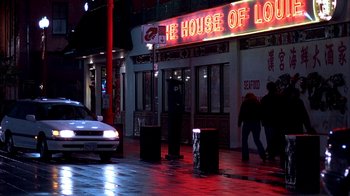 Movie still from “Paranoid Park” (2007), directed by Gus Van Sant – People walking on the sidewalk in front of a restaurant; Extreme Wide shot, Low angle