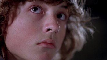 Movie still from “Paranoid Park” (2007), directed by Gus Van Sant – A young boy's face; Extreme Close Up shot, Low angle