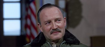 Movie still from “Patton” (1970), directed by Franklin J. Schaffner – An older man with a mustache and a beard; Close Up shot, Low angle