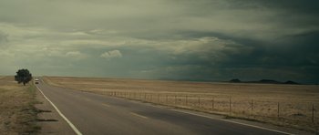 Movie still from “Paul” (2011), directed by Greg Mottola – A road that is in the middle of a field; Extreme Wide shot, High angle