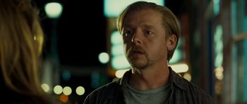 Movie still from “Paul” (2011), directed by Greg Mottola – A person with a beard; Close Up shot, Over the shoulder angle