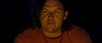 Movie still from “Paul” (2011), directed by Greg Mottola – A person with long brown hair; Close Up shot, Low angle